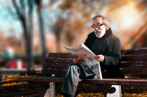 park - Ability Links Older gentleman in a park reading