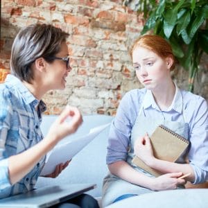 Psychosocial Recovery Coach Talking to anxious person